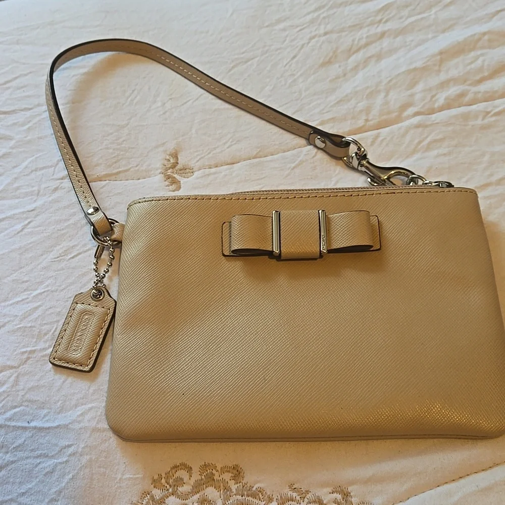 Coach Tan Wristlet Clutch with Bow Accent